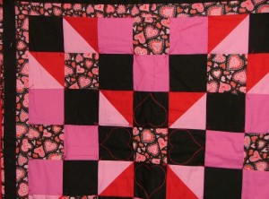 red black heart quilt