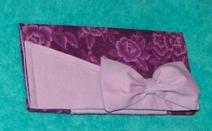 purple wallet outside