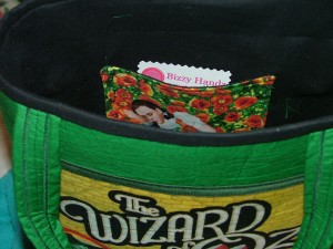 This picture shows the inside. There is one pocket. I placed the Bizzy Handz label inside the pocket.  I can be seen but is not out in the open to distract from the Wizard of Oz designs. 