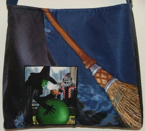 This is a picture of the back. I used a small scene that I had in my stash to make a pocket.  I think it fit the tote well. 